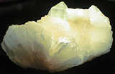 Azure apophyllite prysm on mass of stylbite crystals (10 cm), Poona (India)